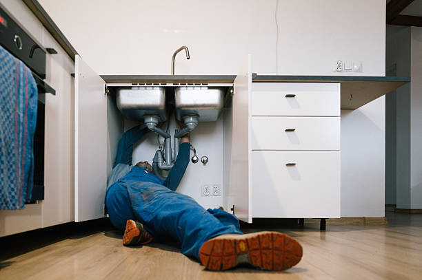 Professional Plumbing technician working in Orchard, CO